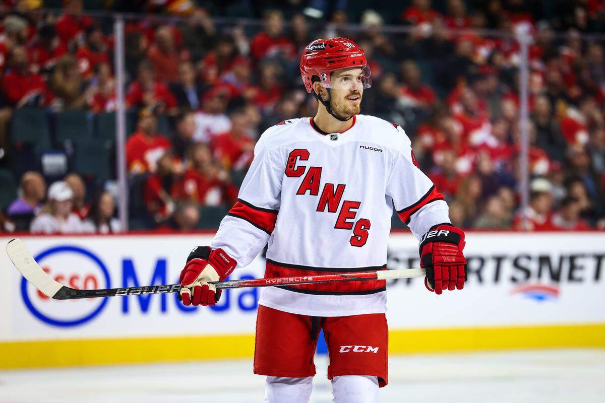 Oct 24, 2024; Calgary, Alberta, CAN; Carolina Hurricanes center Jack Roslovic (96) during the second period against the Calgary Flames at Scotiabank Saddledome. Mandatory Credit: Sergei Belski-Imagn Images