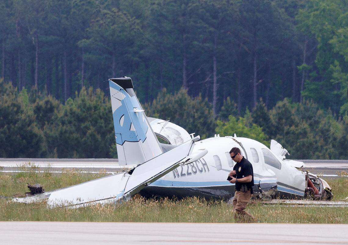 A small plane crashed near a runway at Raleigh-Durham International Airport on Wednesday morning, resulting in a halt of all flights in and out. The single-engine plane belongs to Medical Air Inc. and was used by UNC Air Operations. The plane arrived at RDU from Wilmington International Airport shortly after 10 a.m., according to FlightAware.com, and was carrying two people — the pilot and a physician, according to UNC Health.