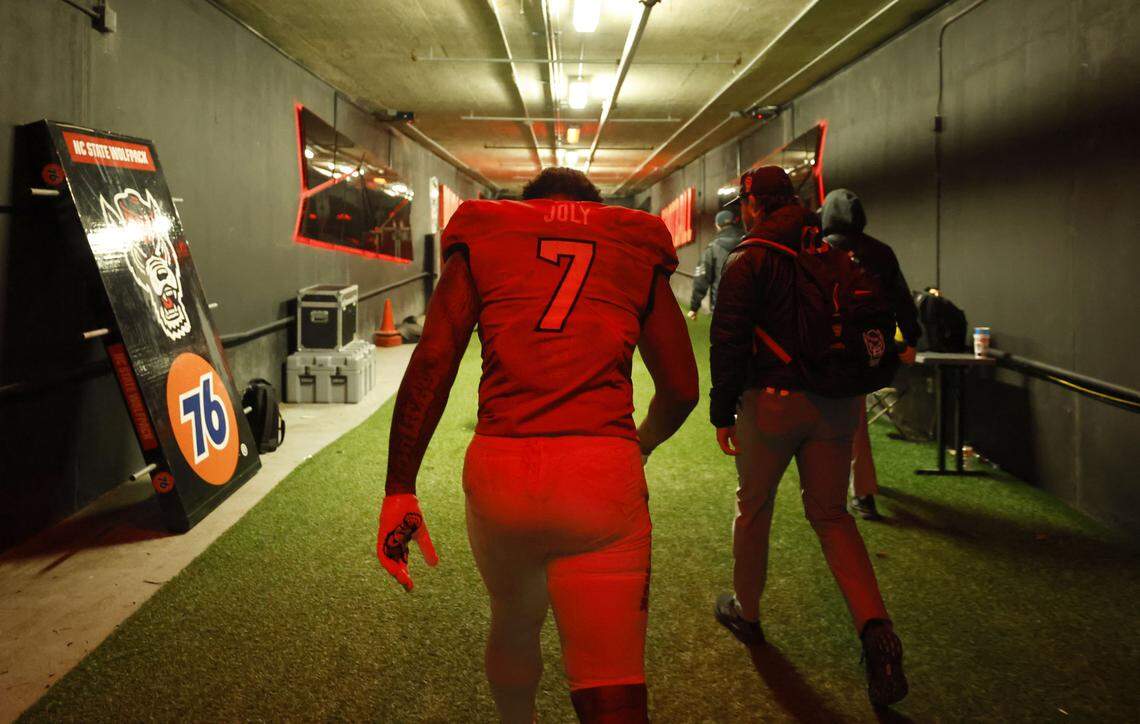 N.C. State’s Justin Joly walks up the tunnel after the Wolfpack’s final home game of the season, a 42-19 victory over UNC, at Carter-Finley Stadium on Nov. 29, 2025.