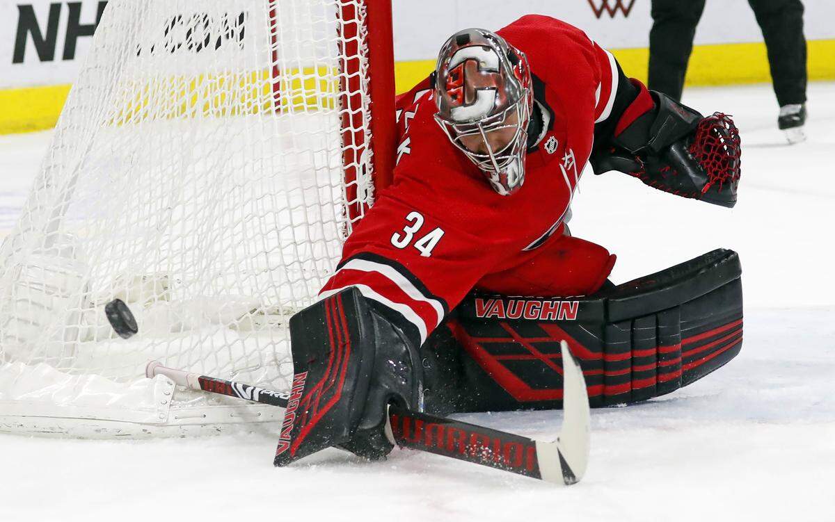 Carolina Hurricanes goaltender Petr Mrazek (34) blocks a shot of the Dallas Stars during the second period of an NHL hockey game, Saturday, Feb. 16, 2019, in Raleigh, N.C. (AP Photo/Karl B DeBlaker)