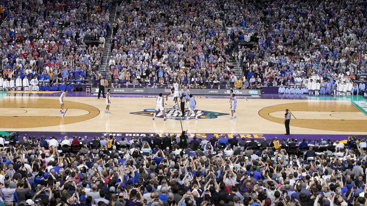 Duke and North Carolina tipoff at the start of their game in the Final Four at Caesars Superdome in New Orleans, La., Saturday, April 2, 2022.