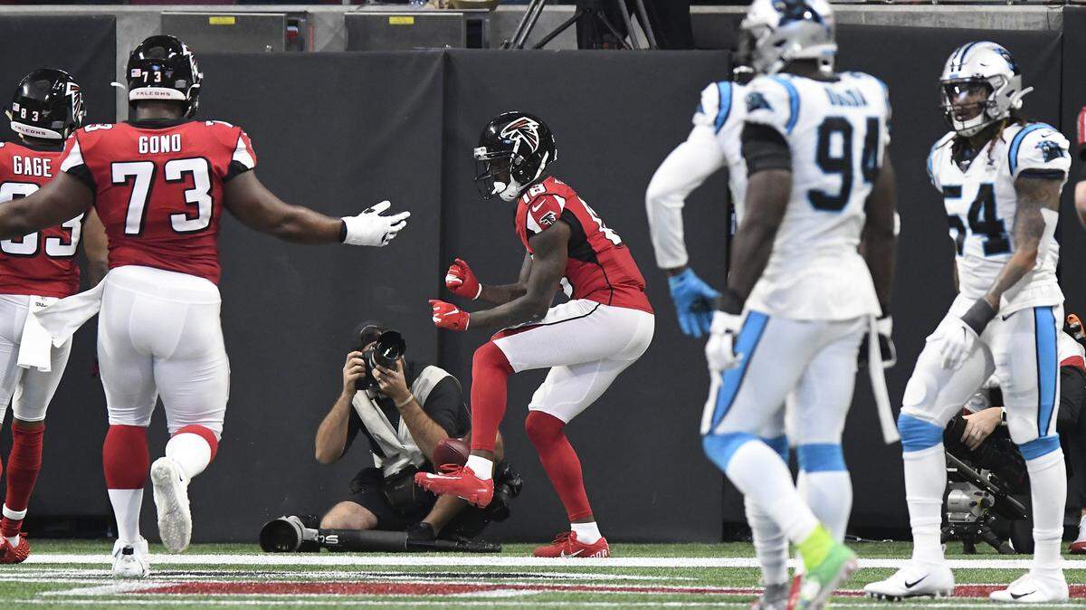 Atlanta Falcons wide receiver Calvin Ridley (18) dances in the end zone after scoring a touchdown against the Carolina Panthers in the first half at Mercedes-Benz Stadium in Atlanta, Ga. on Sunday, December 8, 2019.