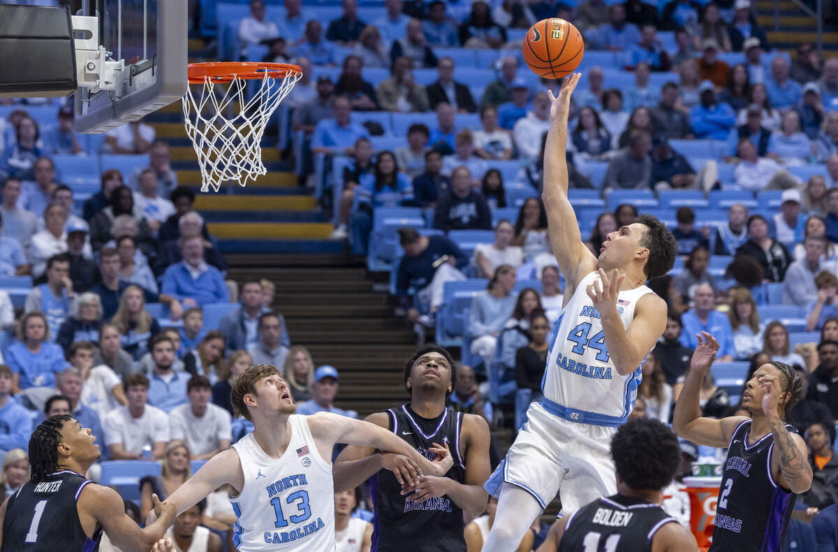 North Carolina guard Luka Bogavac (44) puts up a shot during the second half against over Central Arkansas on Monday, November 3, 2025 at the Smith Center in Chapel Hill, N.C.  Bogavac scored 10 points and had five assists in his first game with North Carolina.