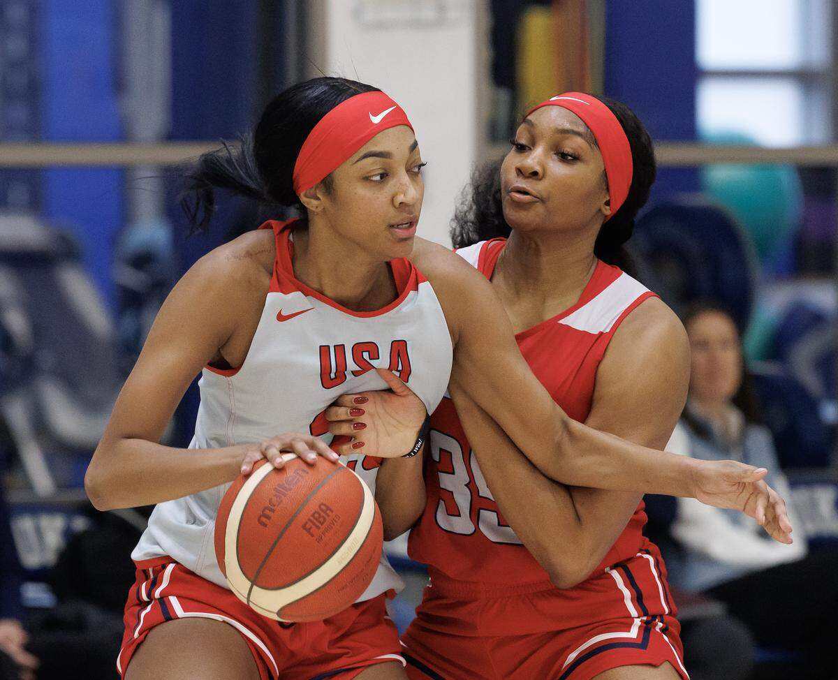 Angel Reese posts up against Kiki Iriafen during USA Basketball Women’s National Team training camp on Friday, Dec. 12, 2025, in Durham, N.C.