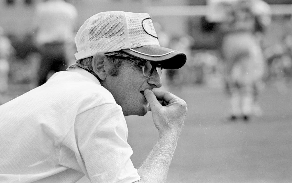 NC State football coach Lou Holtz watches players at a Wolfpack game in 1972.