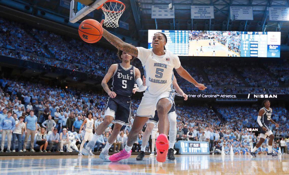 North Carolina’s Armando Bacot (5) saves the ball from going out of bounds during UNC’s 93-84 victory over Duke at the Smith Center in Chapel Hill, N.C., Saturday, Feb. 3, 2024.