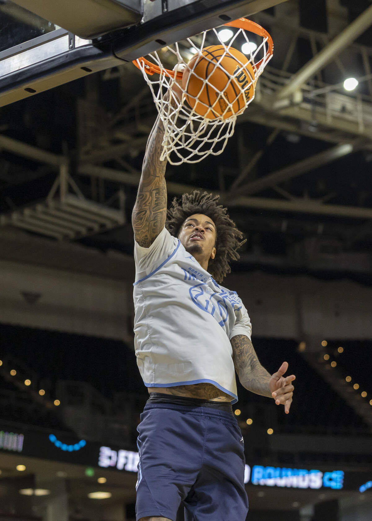 North Carolina guard Jonathan Powell (11) breaks to the rim for a dunk during the Tar Heels’ practice on Wednesday, March 18, 2026 in Greenville, S.C.