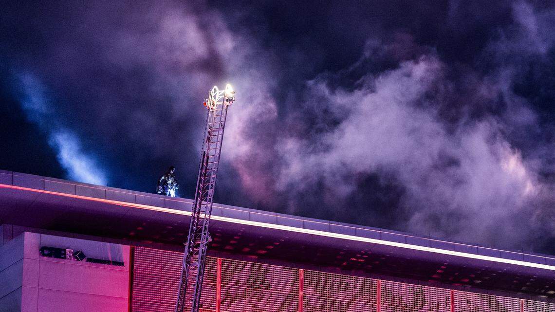 Raleigh firefighters respond to a structure fire Monday night, Dec. 1, 2025, at the Raleigh Convention Center downtown. The fire began on the roof of the convention center when natural gas ignited, Raleigh Public Information Officer Julia Milstead told The News & Observer.