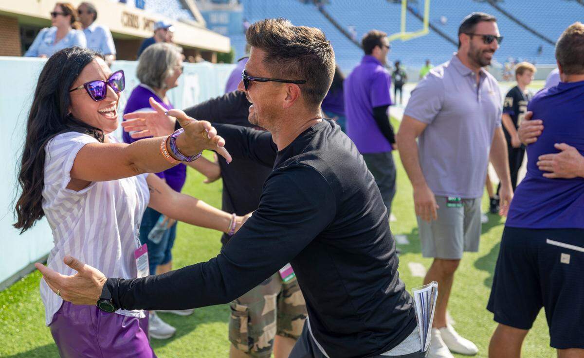 James Madison coach Bob Chesney celebrates with fans following their 70-50 victory over North Carolina on Saturday, September 21, 2024 at Kenan Stadium in Chapel Hill, N.C.