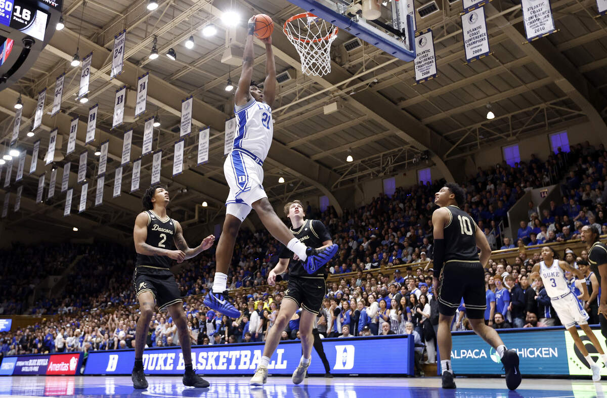 Duke’s Patrick Ngongba (21) slams in two during Duke’s 90-69 victory over Wake Forest at Cameron Indoor Stadium in Durham, N.C., Saturday, Jan. 24, 2026.