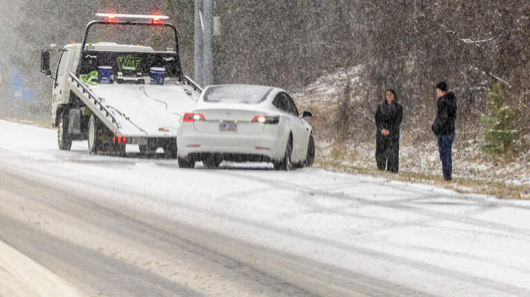 What should good Samaritans do if they see someone stranded on an NC highway?
