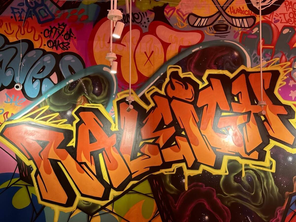 A mural painted at Dave’s Hot Chicken’s Raleigh location.