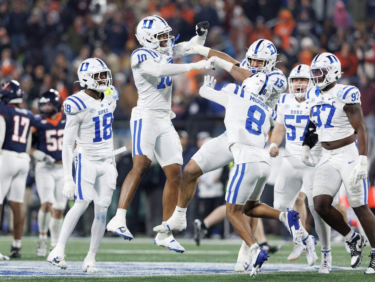 Duke reacts following a faked punt on fourth down during the first half of the ACC Football Championship against Virginia on Saturday, Dec. 6, 2025, at Bank of America Stadium in Charlotte, N.C.