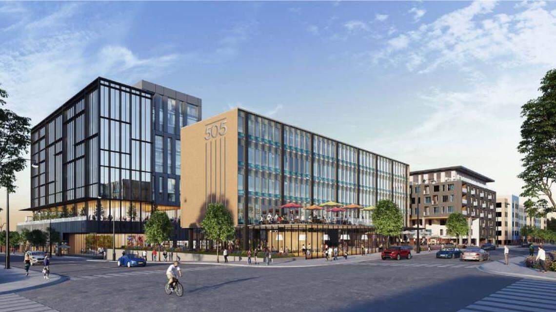 The plan for 505 W. Chapel Hill St. calls for 300 apartments (some of which can be seen on the right in this illustration) and a new commercial office building behind the old police headquarters.