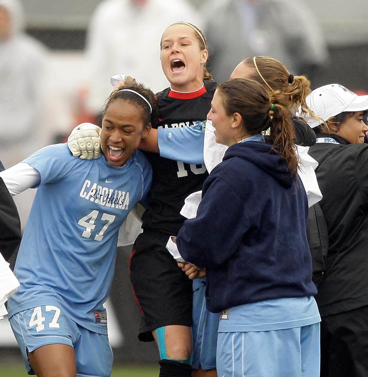 North Carolina’s Jessica McDonald, left, and goalkeeper Ashlyn Harris, middle, celebrate their win over Stanford during the NCAA college women’s soccer championship final, on Sunday, Dec. 6, 2009, in College Station, Texas. North Carolina won 1-0. (AP Photo/Bob Levey)