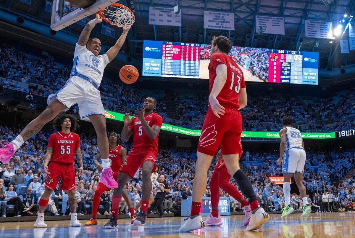 North Carolina’s Armando Bacot (5) gets a dunk for two of his 19 points in the first half against Louisville on Wednesday, January 17, 2024 at the Smith Center in. Chapel Hill, N.C.