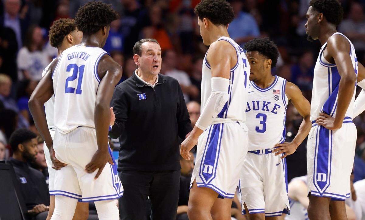 Duke head coach Mike Krzyzewski talks with his team during the first half of Dukes game against Michigan State in the second round of the NCAA Tournament at Bon Secours Wellness Arena in Greenville, S.C., Sunday, March 20, 2022.