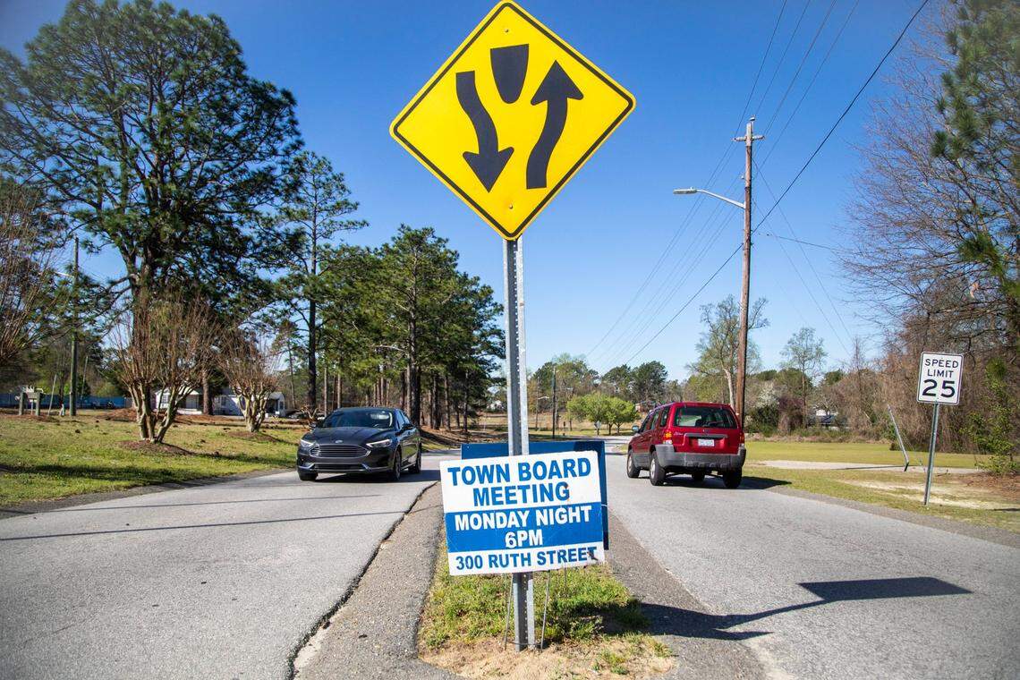 A notice of a town board meeting is posted on Ruth Street in Spring Lake Municipal Building Friday March 25, 2022. The town of Spring Lake is missing nearly $500,000 after hiring a finance director with personal bankruptcies, tax liens and no resume.