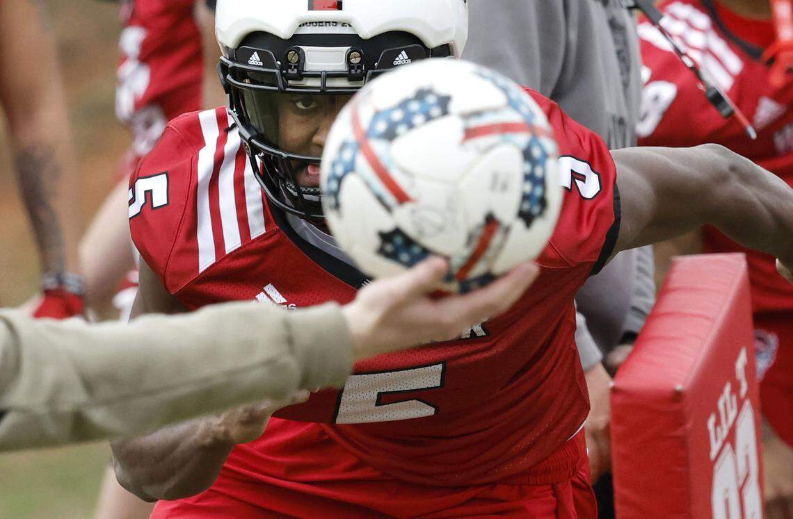 N.C. State wide receiver Noah Rogers (5) runs a drill during the Wolfpack’s first spring practice Tuesday, Feb. 27, 2024.