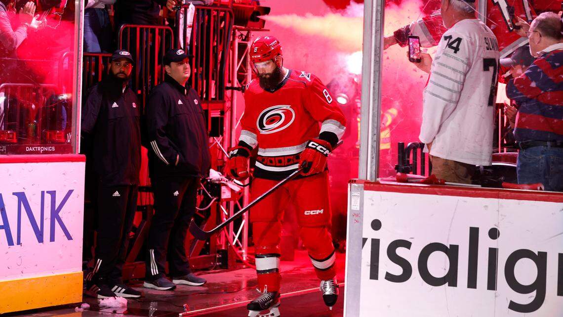 Carolina defenseman Brent Burns (8) heads onto the ice after being introduced before the Carolina Hurricanes game against the Columbus Blue Jackets at PNC Arena in Raleigh, N.C., Wednesday, Oct. 12, 2022.