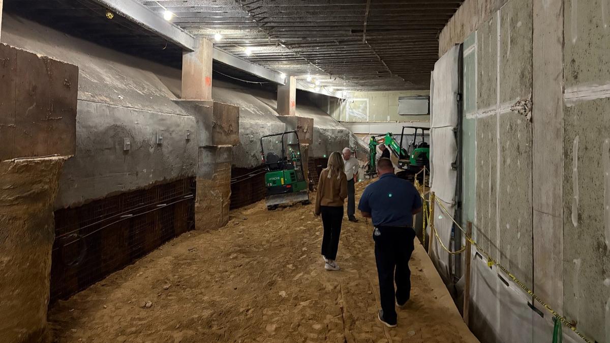 Members of the Centennial Authority, which oversees Lenovo Center, examine the progress of construction to create new space for mechanical equipment under the arena as part of the first phase of $300 million in renovations to the 26-year-old arena.