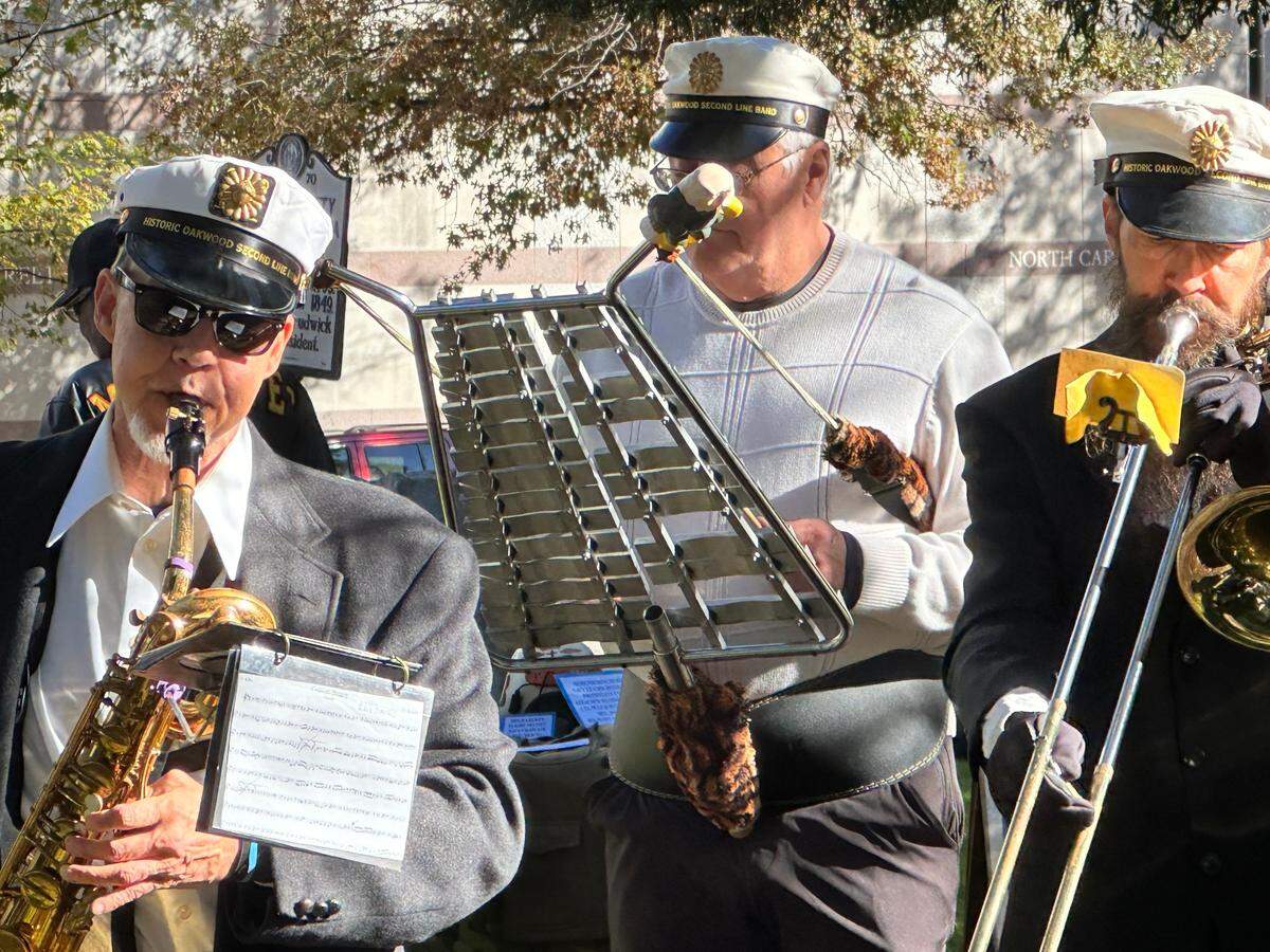 Members of the Oakwood Second Line participate in Raleigh’s Veterans Day ceremony downtown. The parade was canceled.