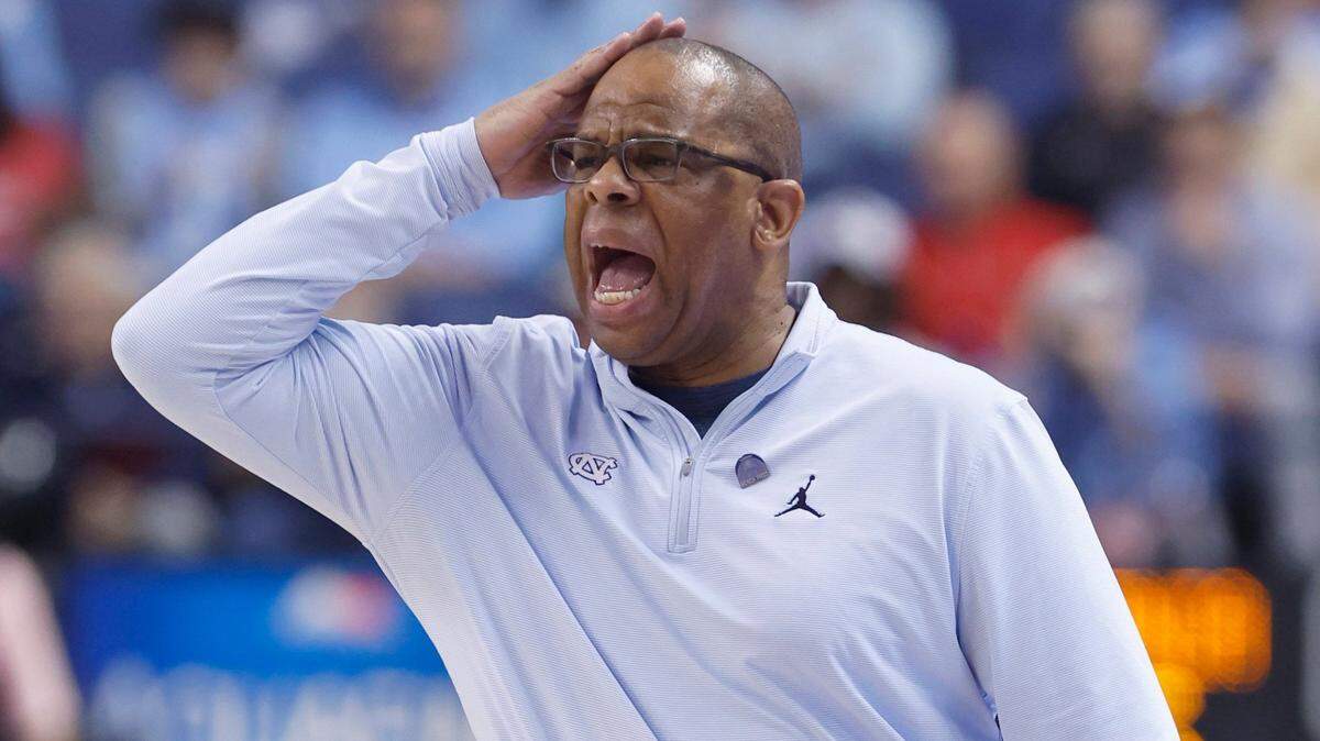 North Carolina head coach Hubert Davis yells to his players during the first half of UNC’s game against Virginia in the quarterfinals of the ACC Men’s Basketball Tournament in Greensboro, N.C., Thursday, March 9, 2023.