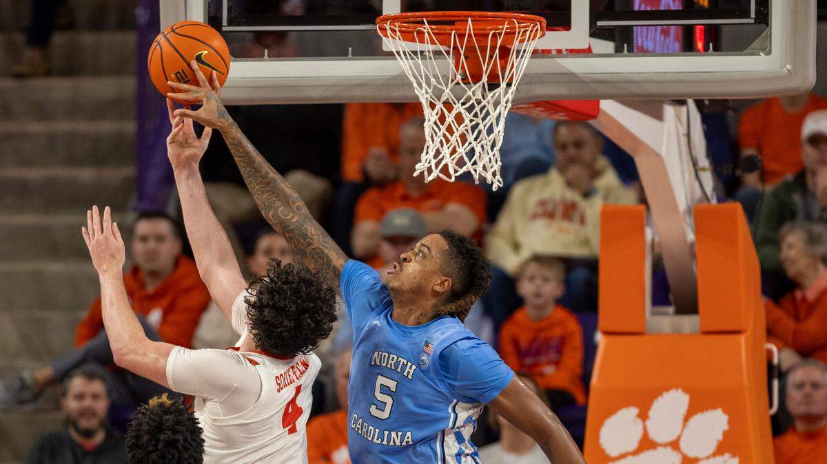 North Carolina’s Armando Bacot (5) blocks a shot by Clemson’s Ian Schieffelin (4) in the second half on Saturday, January 6, 2024 at Littlejohn Coliseum in Clemson, S.C.