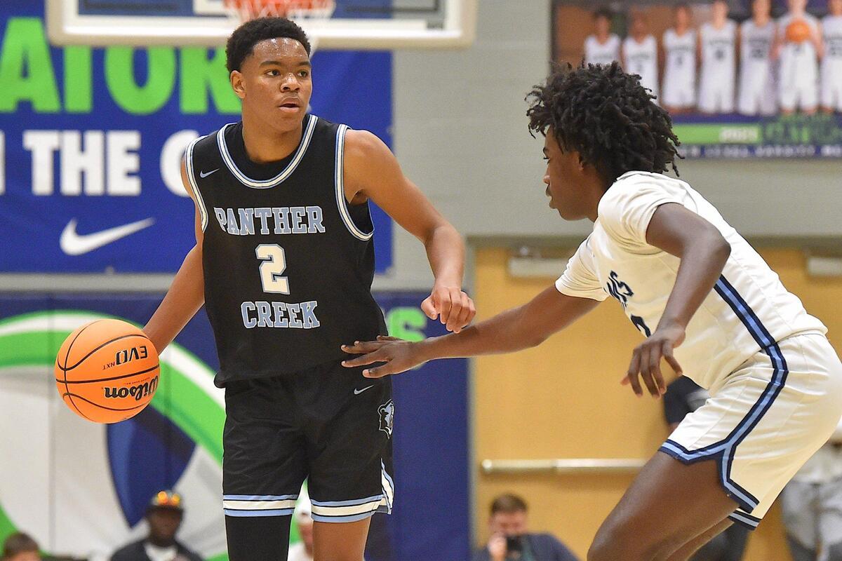 Panther Creek’s Amari Odom (2) control s the ball against Cleveland’s Cleveland’s Jayse Barrett (2) in the second half. The Panther Creek Catamounts and the Cleveland Rams met in the NCHSAA 4A Boys East Regional Finals in Cary, N.C. on March 5, 2022.