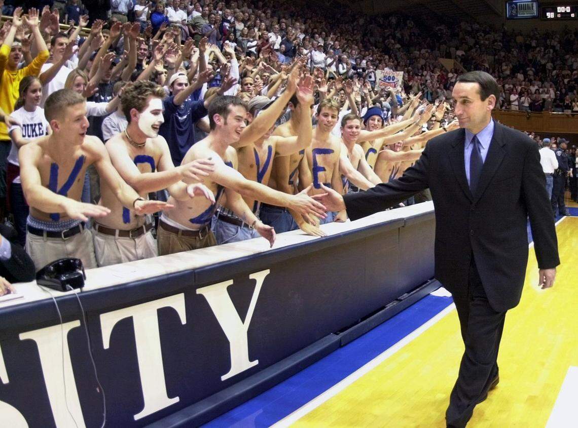 Mike Krzyzewski greets the “Crazies” at Cameron Indoor Stadium Friday, November 17, 2000 following his 500th victory as the team’s head coach. Duke defeated Villanova 98-85.