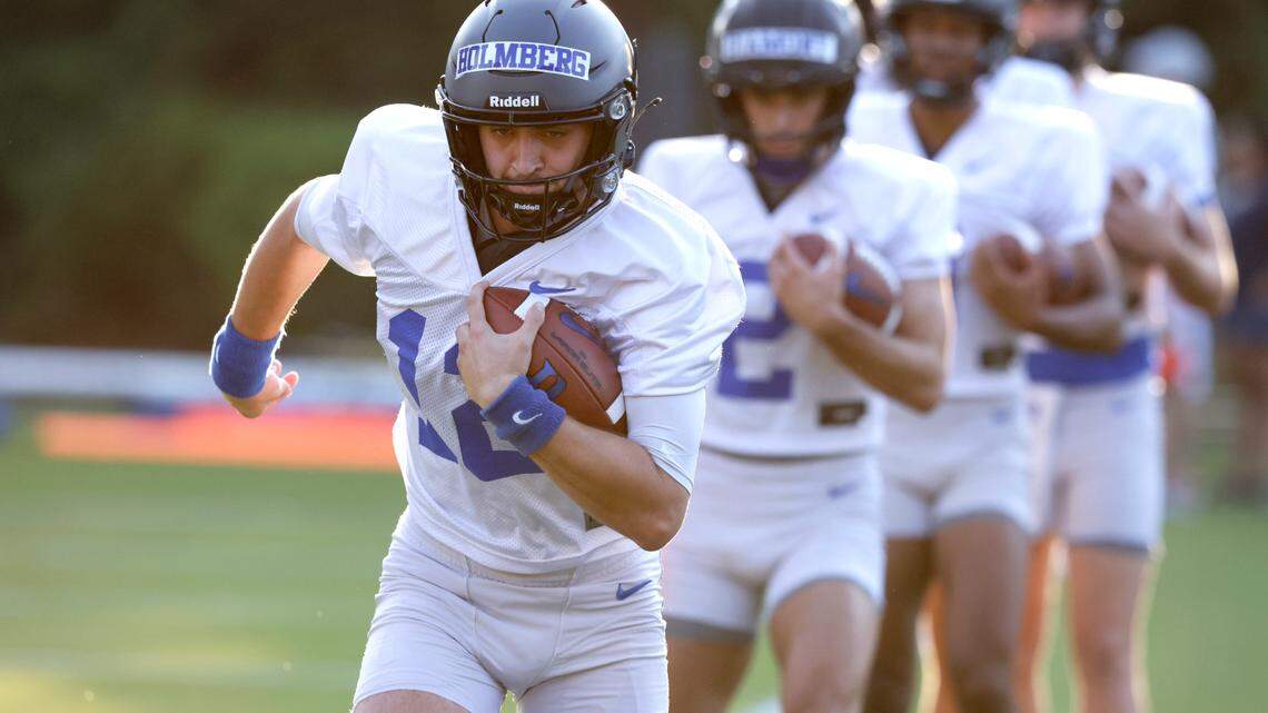 Duke quarterback Gunnar Holmberg (12) runs drills during Duke’s first practice of fall camp in Durham, N.C., Thursday, August 5, 2021.
