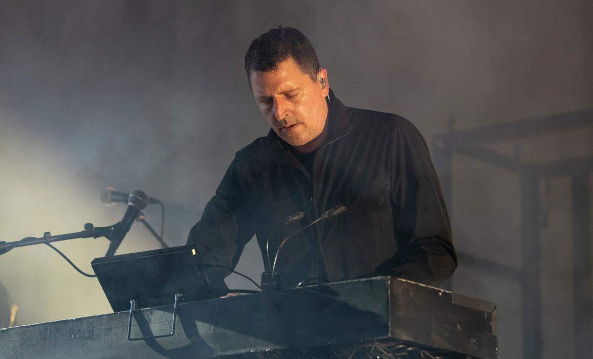 Atticus Ross on keyboard and synth as Nine Inch Nails open its 2022 U.S. tour at Raleigh, N.C.’s Red Hat Amphitheater, Thursday night, April 28, 2022.