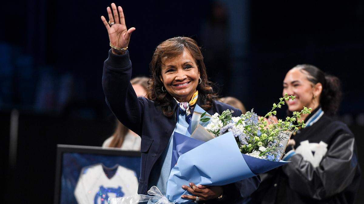Martina Ballen waves to the crowd during a ceremony honoring her upon her retirement at a UNC gymnastics meet against Pittsburgh on at Carmichael Arena in Chapel Hill on Jan. 23, 2026.