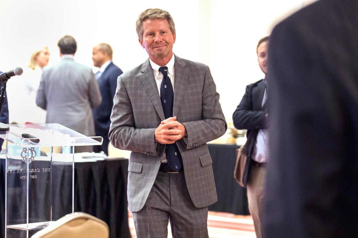 UNC-Chapel Hill Chancellor Kevin Guskiewicz talks with members before the start of a UNC Board of Trustees meeting at The Carolina Inn in Chapel Hill, N.C. on Wednesday, July 14, 2021.