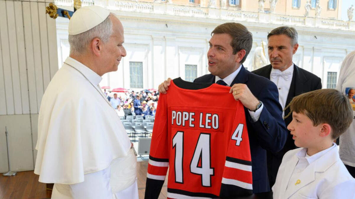 North Carolina Commissioner of Labor Luke Farley presents Pope Leo XIV a Carolina Hurricanes jersey during a recent visit to the Vatican.