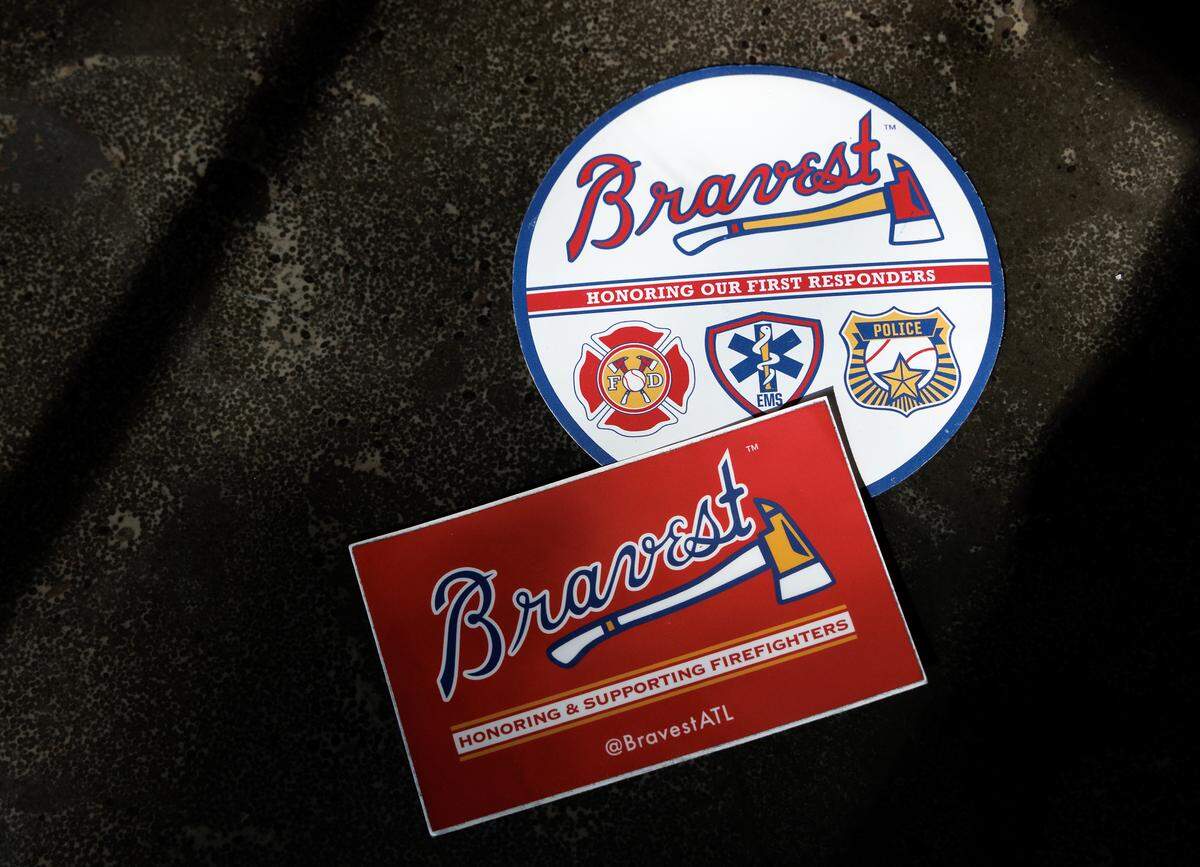 “Bravest ATL” merchandise is pictured on Wednesday, April 16, 2025, in Durham, N.C. Chris Buccafusco and his brother want to change the Atlanta Braves name to “Bravest” to respect Native Americans. The symbol uses an ax instead of a tomahawk, which they say could represent all first-responders.