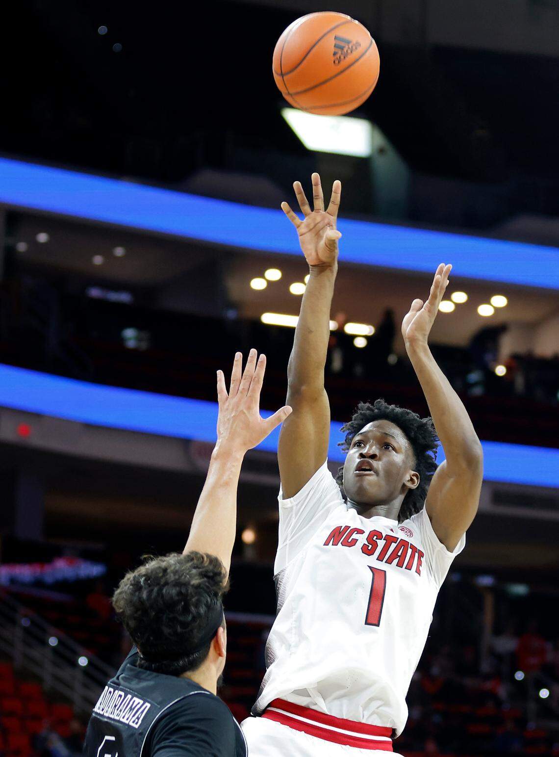 North Carolina State Wolfpack guard Jarkel Joiner shoots over Florida International Golden Panthers forward Nick Guadarrama during the first half of a men’s basketball game at PNC Arena on Tuesday, Nov. 15, 2022, in Raleigh, N.C.
