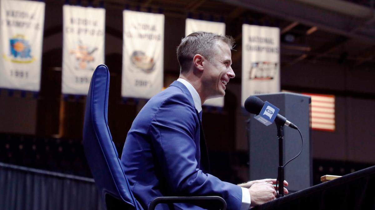 Jon Scheyer smiles after being introduced as Duke basketballís 20th head coach during a press conference at Cameron Indoor Stadium in Durham, N.C., Friday, June 4, 2021.