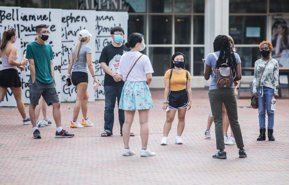 New students at UNC-Chapel Hill participate in a campus orientation tour starting in “The Pit” on Thursday, Aug. 6, 2020. Students did not receive the normal first year summer orientation due to COVID-19.