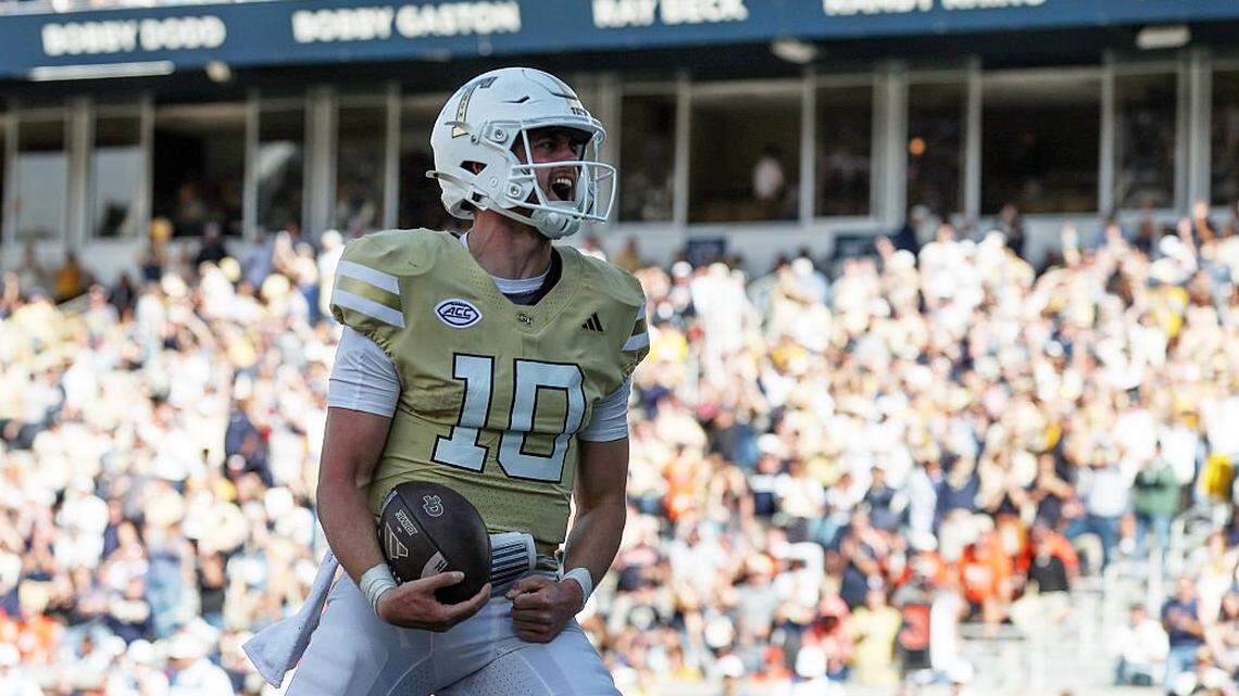 ATLANTA, GEORGIA - OCTOBER 25: Haynes King #10 of the Georgia Tech Yellow Jackets reacts after scoring a touchdown against the Syracuse Orange at Bobby Dodd Stadium on October 25, 2025 in Atlanta, Georgia. (Photo by Randy J. Williams/Getty Images)