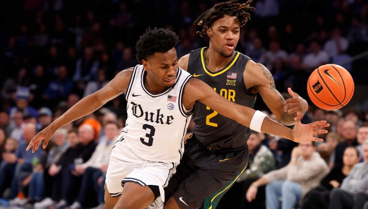 Duke’s Jeremy Roach (3) and Baylor’s Jayden Nunn (2) go after the ball during the first half of Duke’s game against Baylor at Madison Square Garden in New York City Wednesday, Dec. 20, 2023.