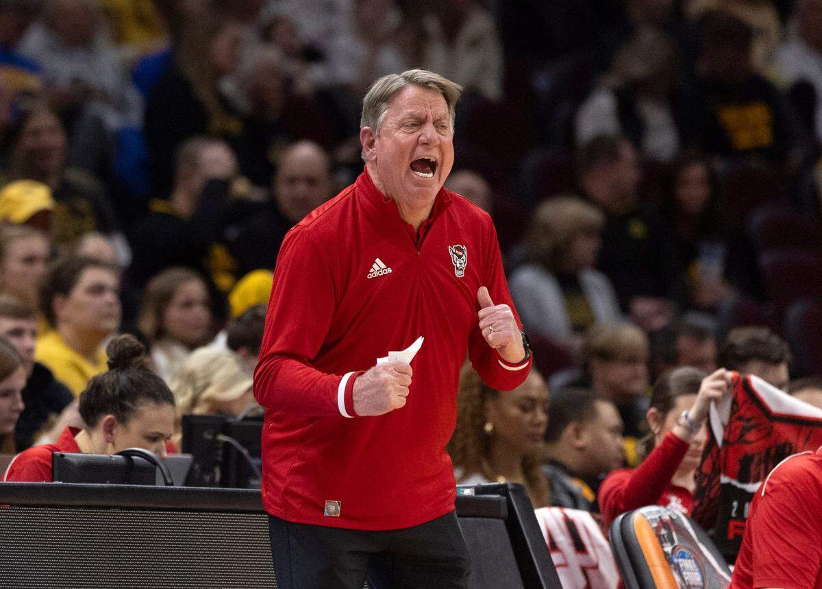 NC State coach Wes Moore encourages his team during the first half of the Wolfpack’s Final Four matchup at Rocket Mortgage FieldHouse on Friday, April 5, 2024, in Cleveland, Ohio.