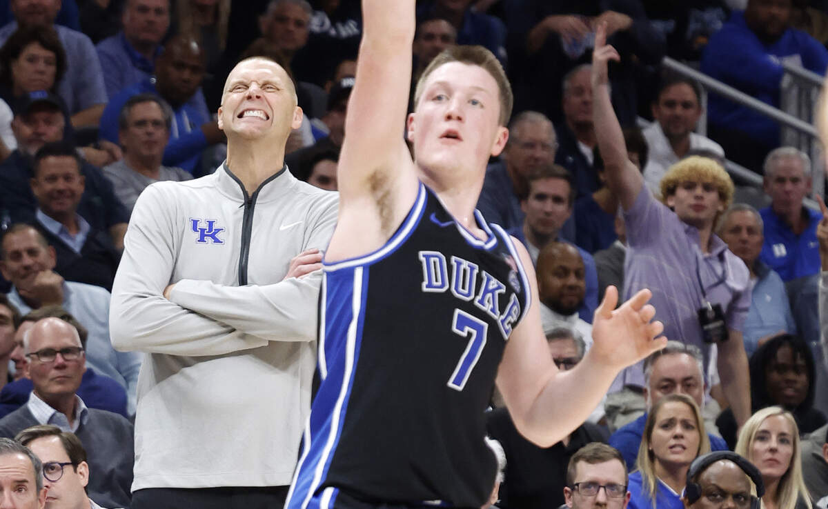 Kentucky head coach Mark Pope watches as Duke’s Kon Knueppel (7) males a three-pointer in the first half of Duke’s game against Kentucky in the State Farm Champions Classic in Atlanta, Ga., Tuesday, Nov. 12, 2024.