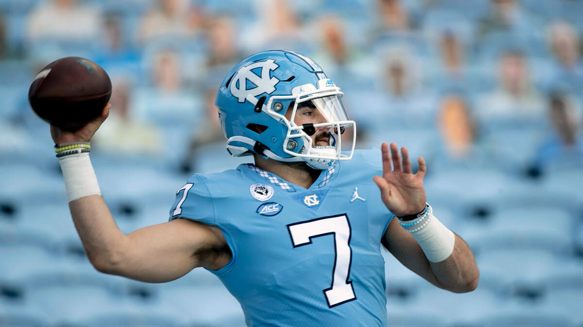 North Carolina quarterback Sam Howell (7) warms up for the Tar Heels’ game against Western Carolina on Saturday, December 5, 2020 at Kenan Stadium in Chapel Hill, N.C.