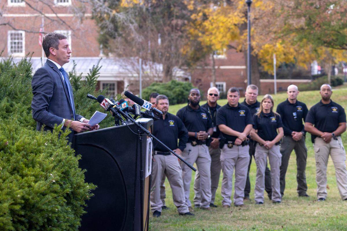 Assistant District Attorney Jeff Nieman announces that 17-yrae-old Issiah Mehki Ross faces two counts of murder in the killings of 14-year-old Lyric Woods and 18-year-old Devin Clark during a press conference in Hillsborough Monday, Nov. 7, 2022. Ross is being held without bail and could face life in prison if convicted. Suspects under 18 cannot get the death penalty in North Carolina