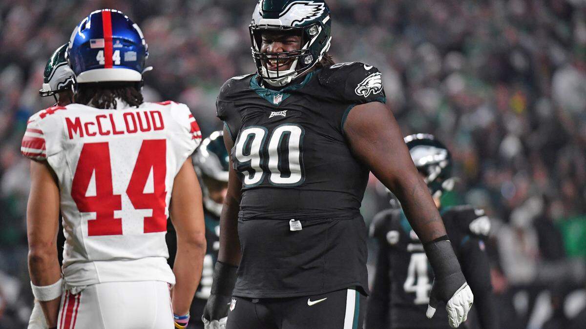 Dec 25, 2023; Philadelphia, Pennsylvania, USA; Philadelphia Eagles defensive tackle Jordan Davis (90) against New York Giants cornerback Nick McCloud (44) at Lincoln Financial Field.