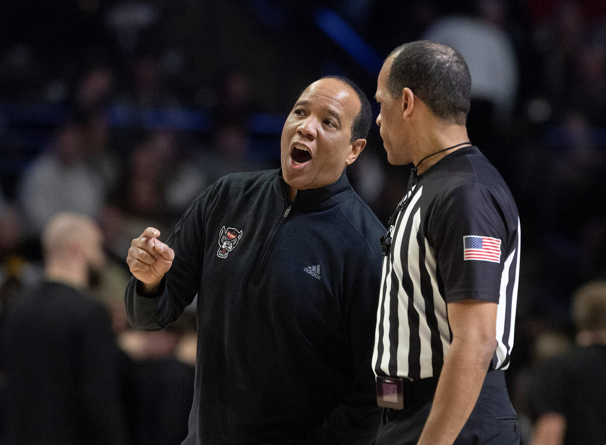 N.C. State head coach Kevin Keatts speaks with an official during the second half of the Wolfpack’s 77-59 loss to Wake Forest on Saturday, Jan. 4, 2025, at Lawrence Joel Veterans Memorial Coliseum in Winston-Salem, N.C.