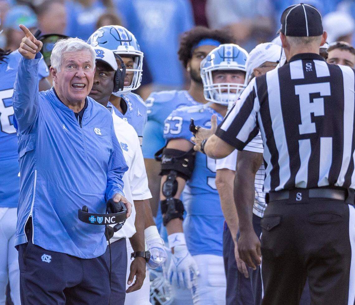 North Carolina coach Mack Brown argues with official Wayne Rundell in the fourth quarter against Minnesota on Saturday, September 16, 2023 at Kenan Stadium in Chapel Hill N.C.