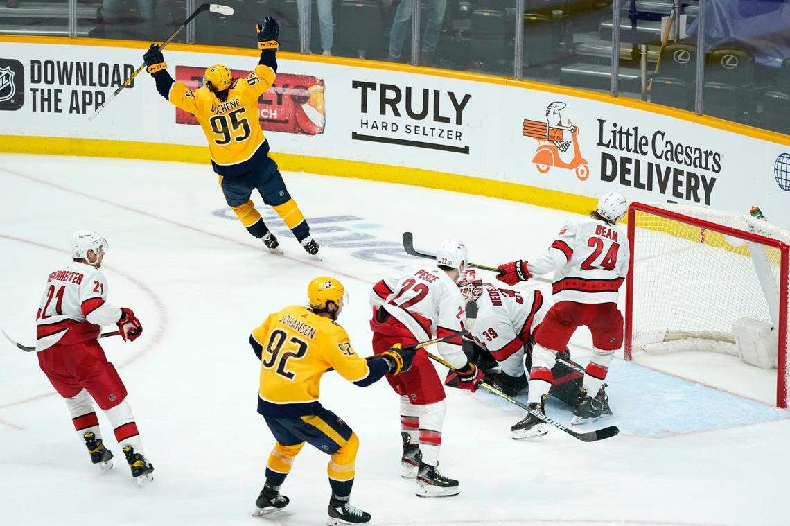 Nashville Predators center Matt Duchene (95) celebrates after scoring the winning goal against the Carolina Hurricanes during the second overtime in Game 3 of an NHL hockey Stanley Cup first-round playoff series Friday, May 21, 2021, in Nashville, Tenn. The Predators won 5-4. (AP Photo/Mark Humphrey)
