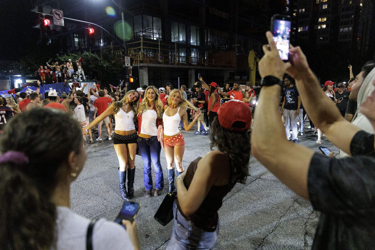 Fans took pictures and celebrated in the streets after the Carolina Hurricanes won their second Stanley Cup in Glenwood South District on June 14, 2026, in Raleigh, North Carolina. The Hurricanes last won the Stanley Cup in 2006.